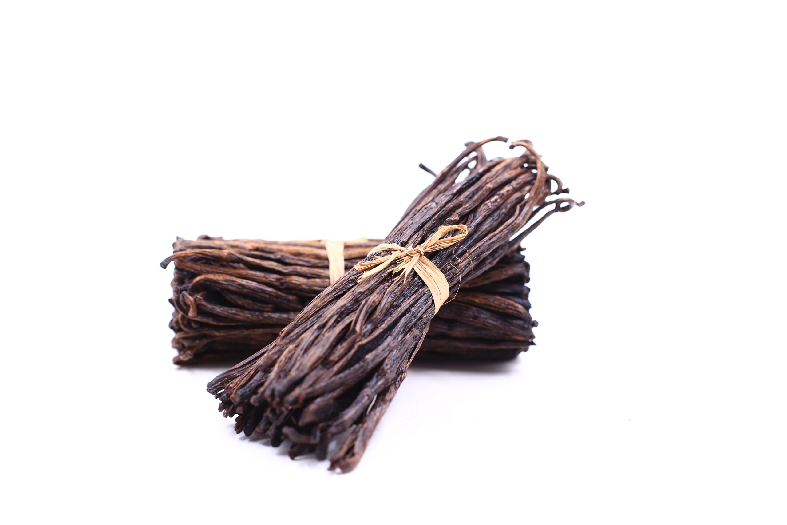 Cut vanilla beans for extraction and processing